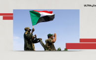 جنود بالجيش السوداني يحملون علم السودان